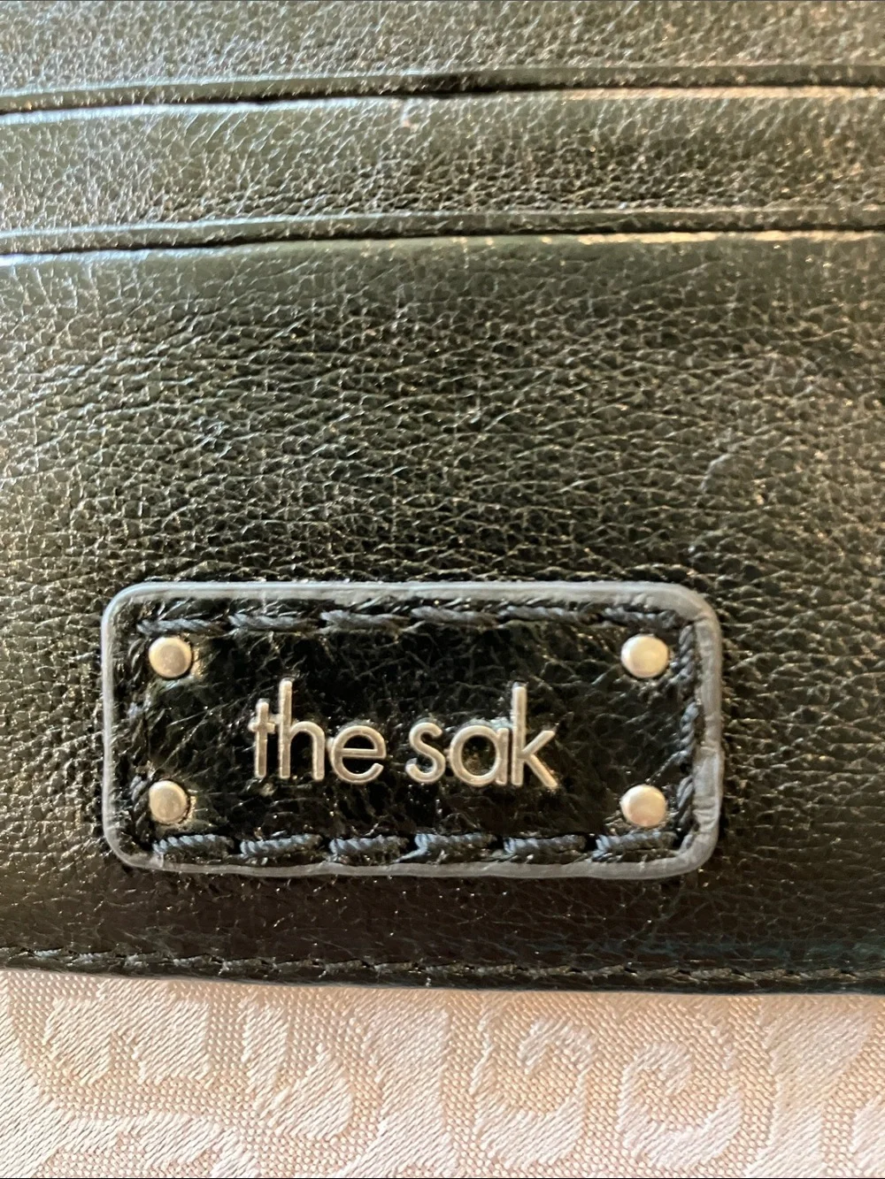 The Sak Black Leather Card & Key Holder with Embossed Detail